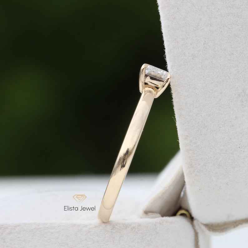 East West Emerald Cut Solitaire Ring