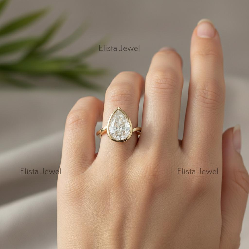 Pear Cut Lab-Grown Diamond Ring, 14K Yellow Gold Bezel Solitaire