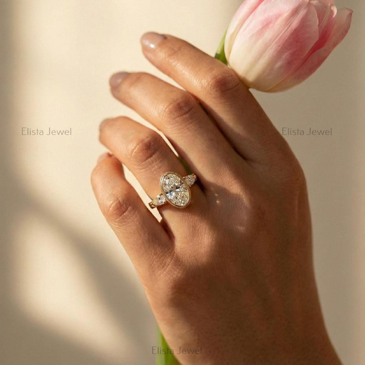 Oval Diamond Ring Lab-Grown Three-Stone Engagement 14K Yellow Gold Bezel With Pear Accents