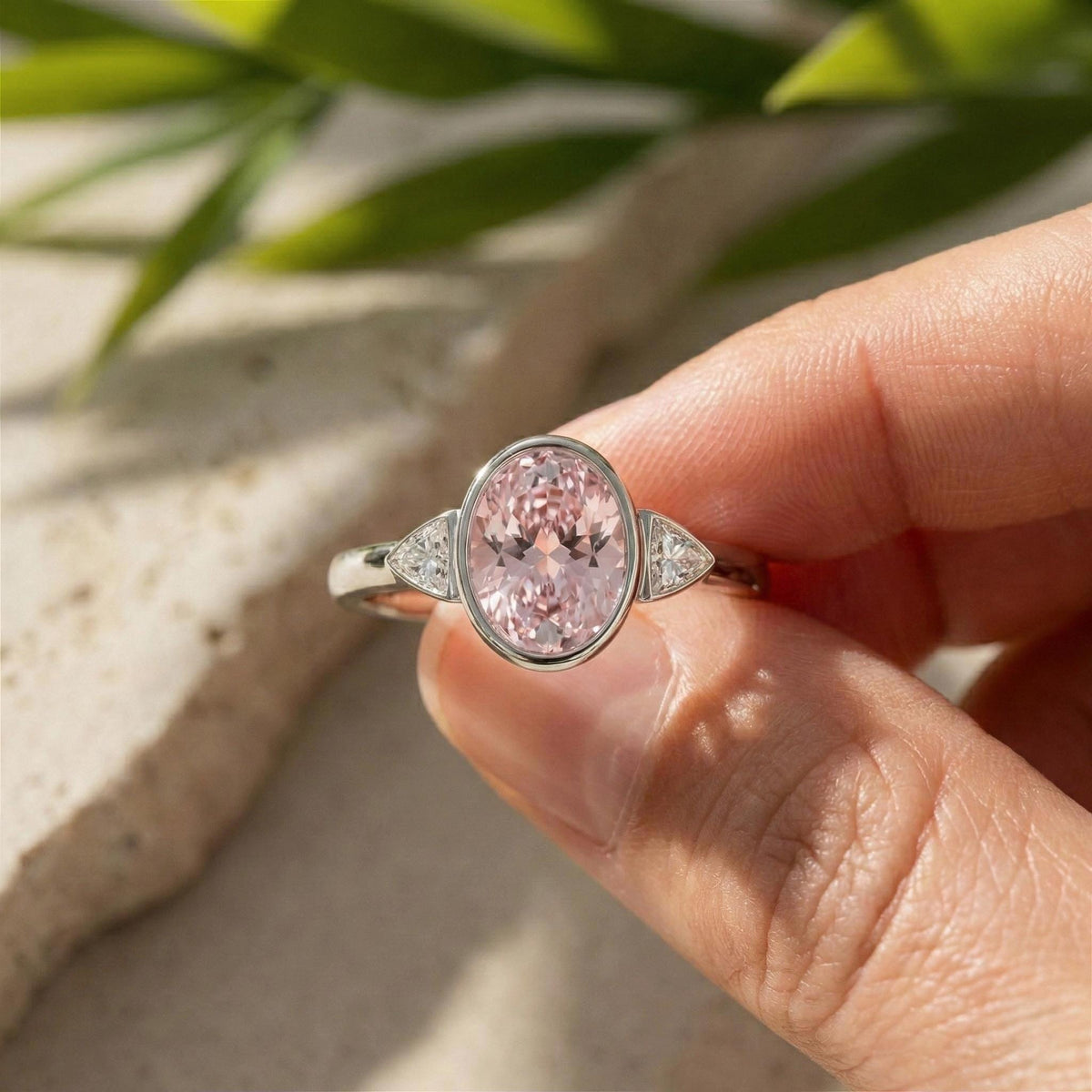Oval Lab Grown Diamond Pink Three Stone Bezel Engagement Ring