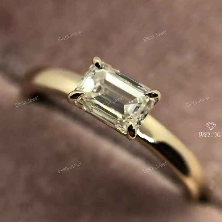 East West Emerald Cut Solitaire Ring