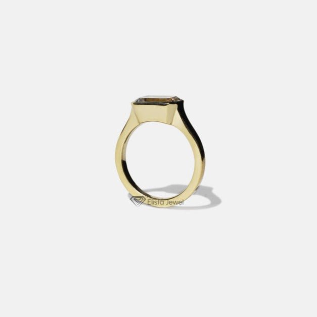 East West Emerald Solitaire Full Bezel Lab Grown Diamond Ring in 18K - Angled View