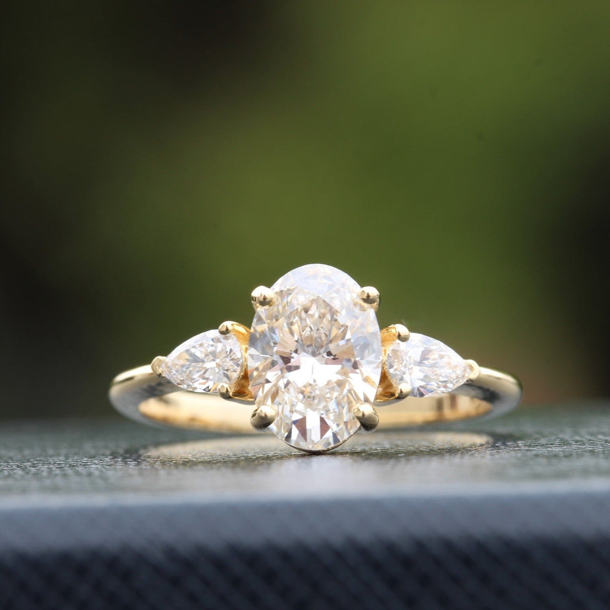 Oval Cut Hidden Halo Three Stone Lab Grown Diamond Ring in 10K - Front View