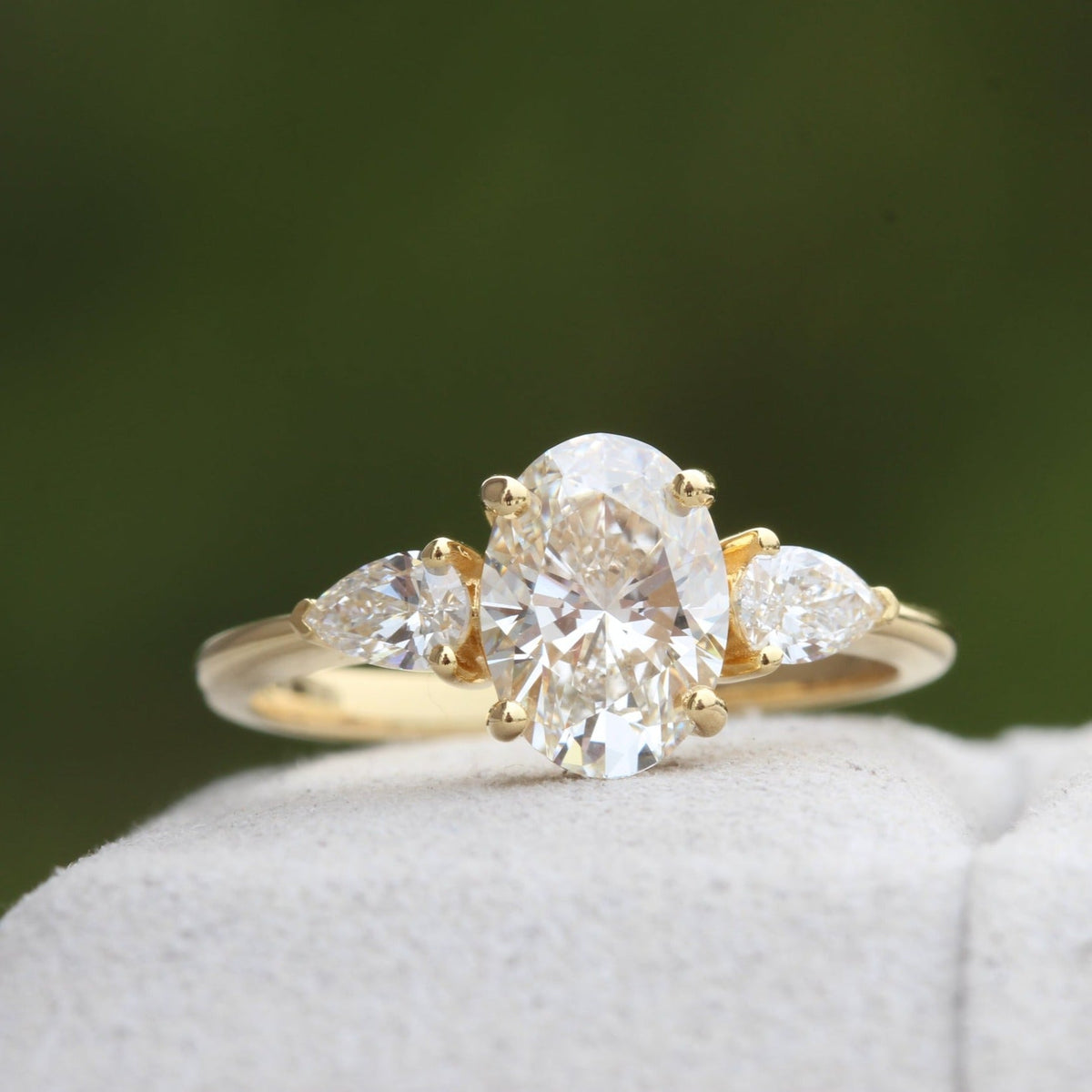 Oval Cut Hidden Halo Three Stone Lab Grown Diamond Ring - Profile View