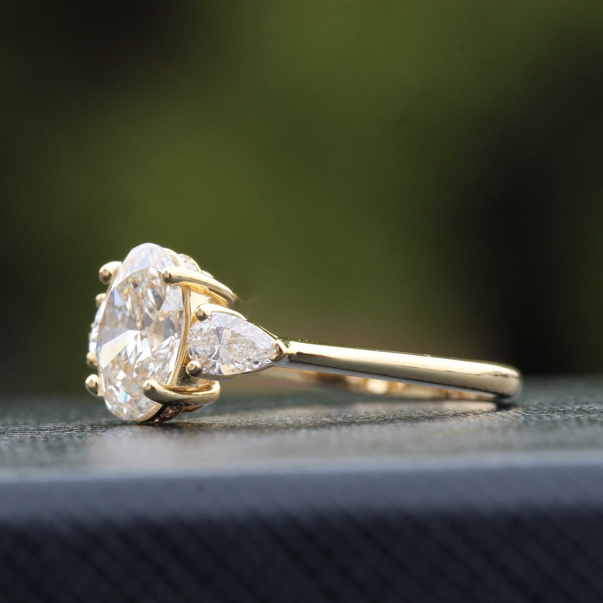 Oval Cut Hidden Halo Three Stone Lab Grown Diamond Ring in 14K - Side View