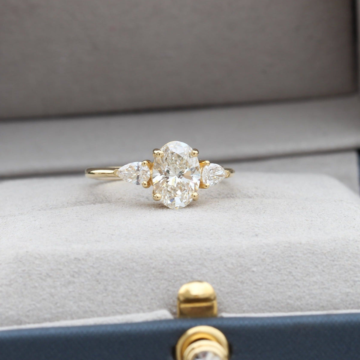 Oval Cut Hidden Halo Three Stone Lab Grown Diamond Ring - Close-up View