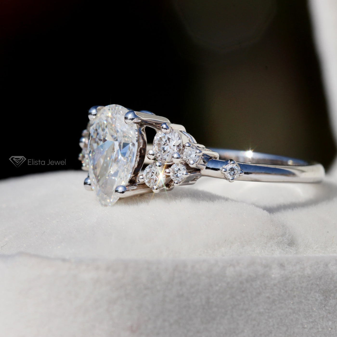 Pear Cut Solitaire Accent Engagement Ring
