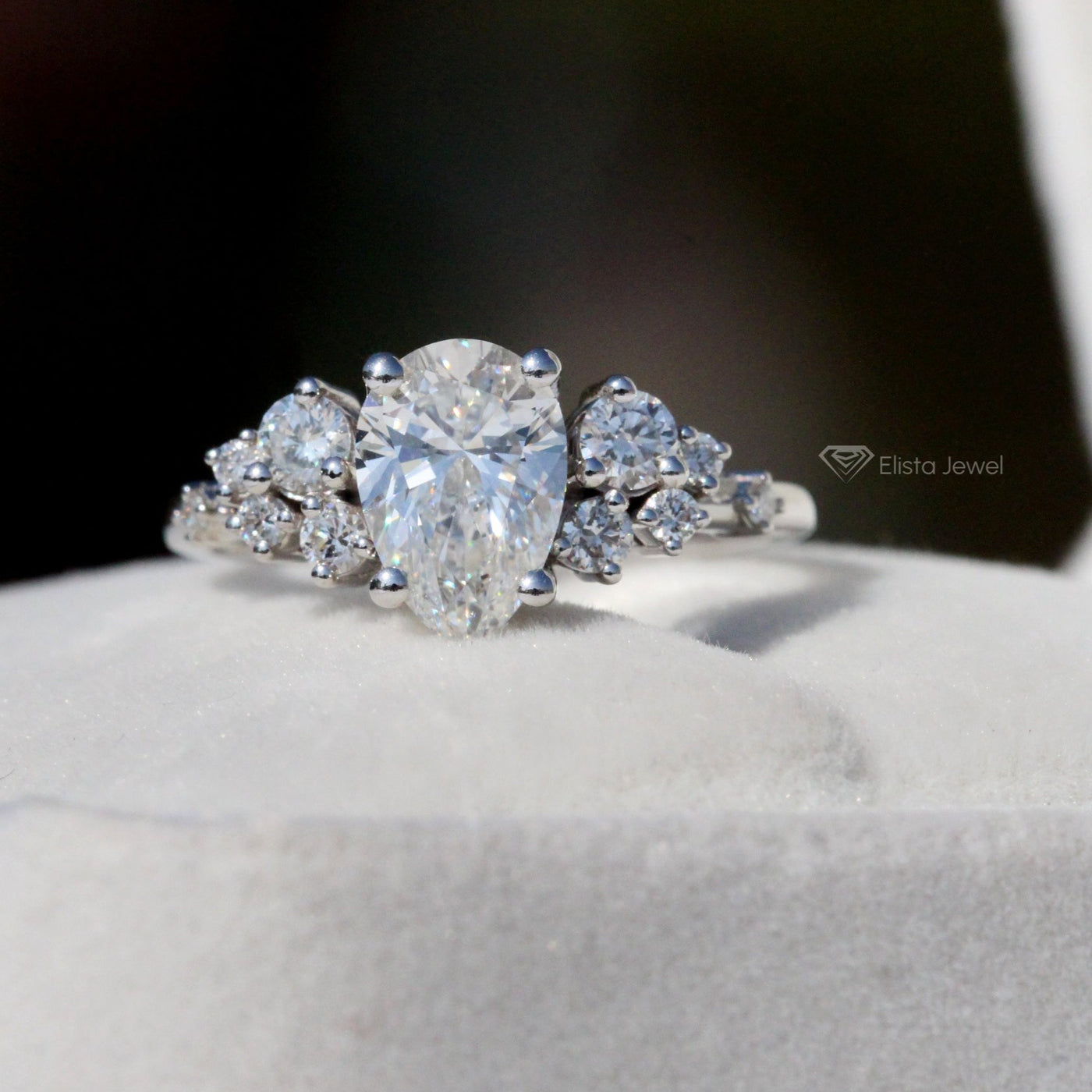 Pear Cut Solitaire Accent Engagement Ring