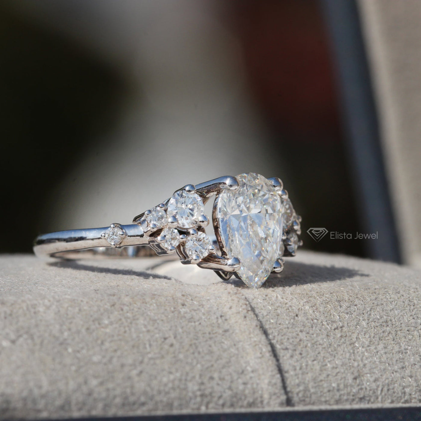 Pear Cut Solitaire Accent Engagement Ring