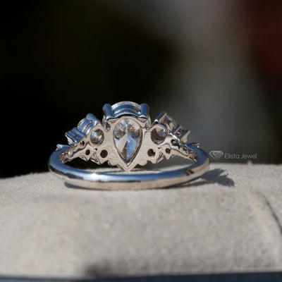 Pear Cut Solitaire Accent Engagement Ring