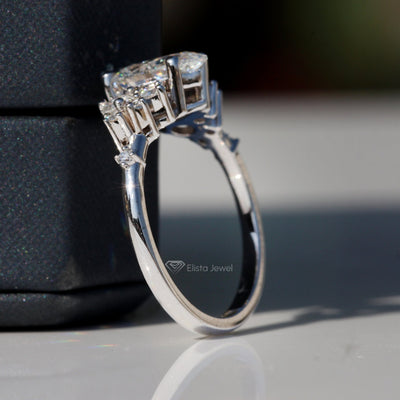 Pear Cut Solitaire Accent Engagement Ring