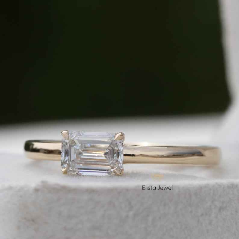 East West Emerald Cut Solitaire Ring