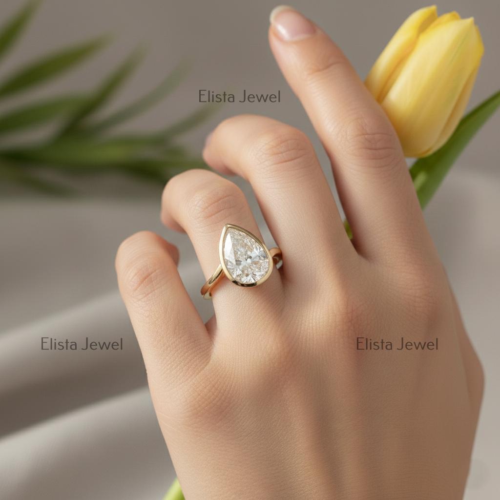 Pear Cut Lab-Grown Diamond Ring, 14K Yellow Gold Bezel Solitaire