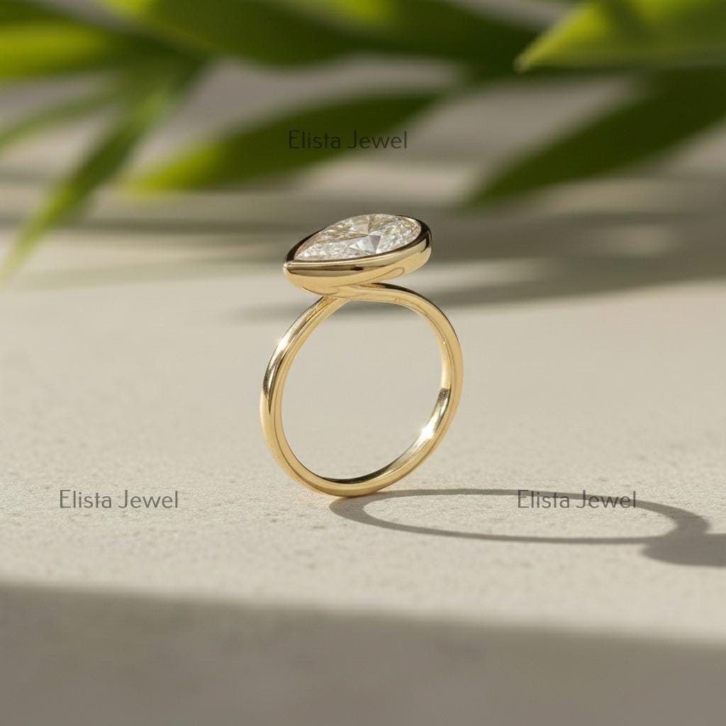 Pear Cut Lab-Grown Diamond Ring, 14K Yellow Gold Bezel Solitaire