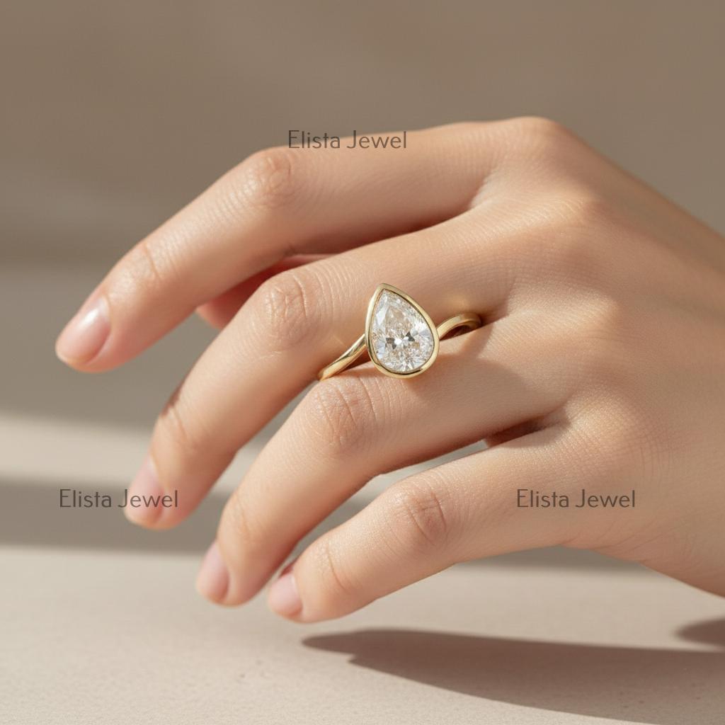 Pear Cut Lab-Grown Diamond Ring, 14K Yellow Gold Bezel Solitaire