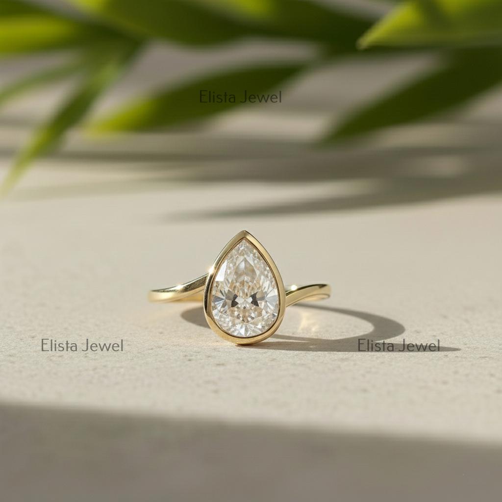 Pear Cut Lab-Grown Diamond Ring, 14K Yellow Gold Bezel Solitaire