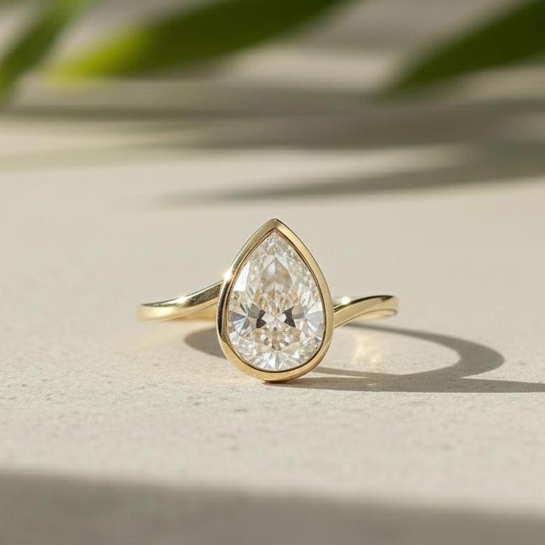 Pear Cut Lab-Grown Diamond Ring, 14K Yellow Gold Bezel Solitaire