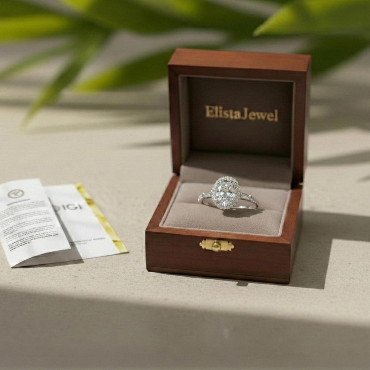 Oval Lab Grown Diamond Halo Engagement Ring With Baguette Side Stones