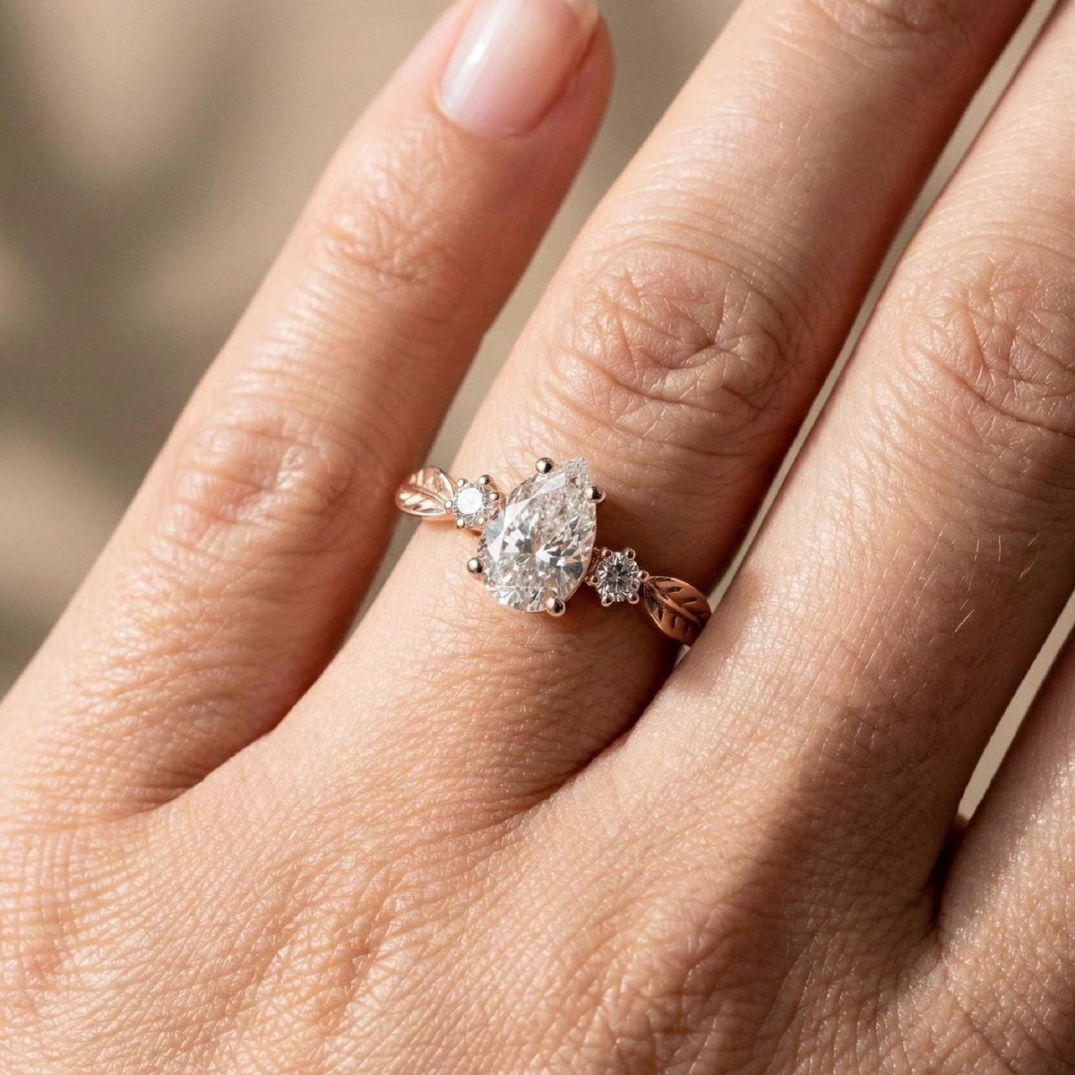 Pear Engagement Ring, Lab-Grown Diamond Rose Gold Leaf Three Stone
