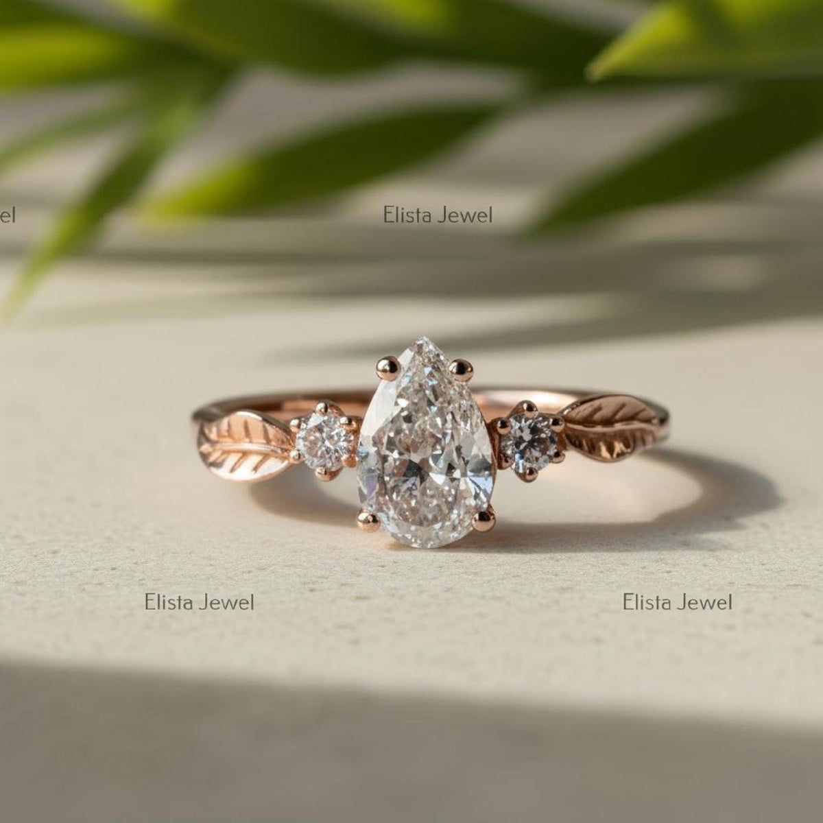 Pear Engagement Ring, Lab-Grown Diamond Rose Gold Leaf Three Stone