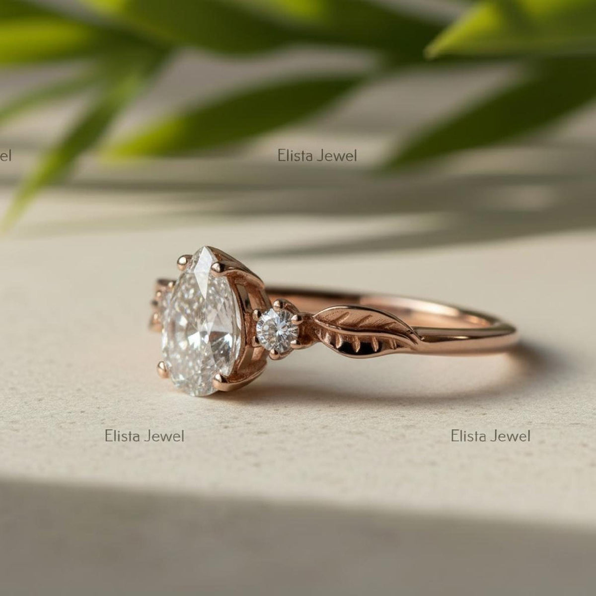 Pear Engagement Ring, Lab-Grown Diamond Rose Gold Leaf Three Stone