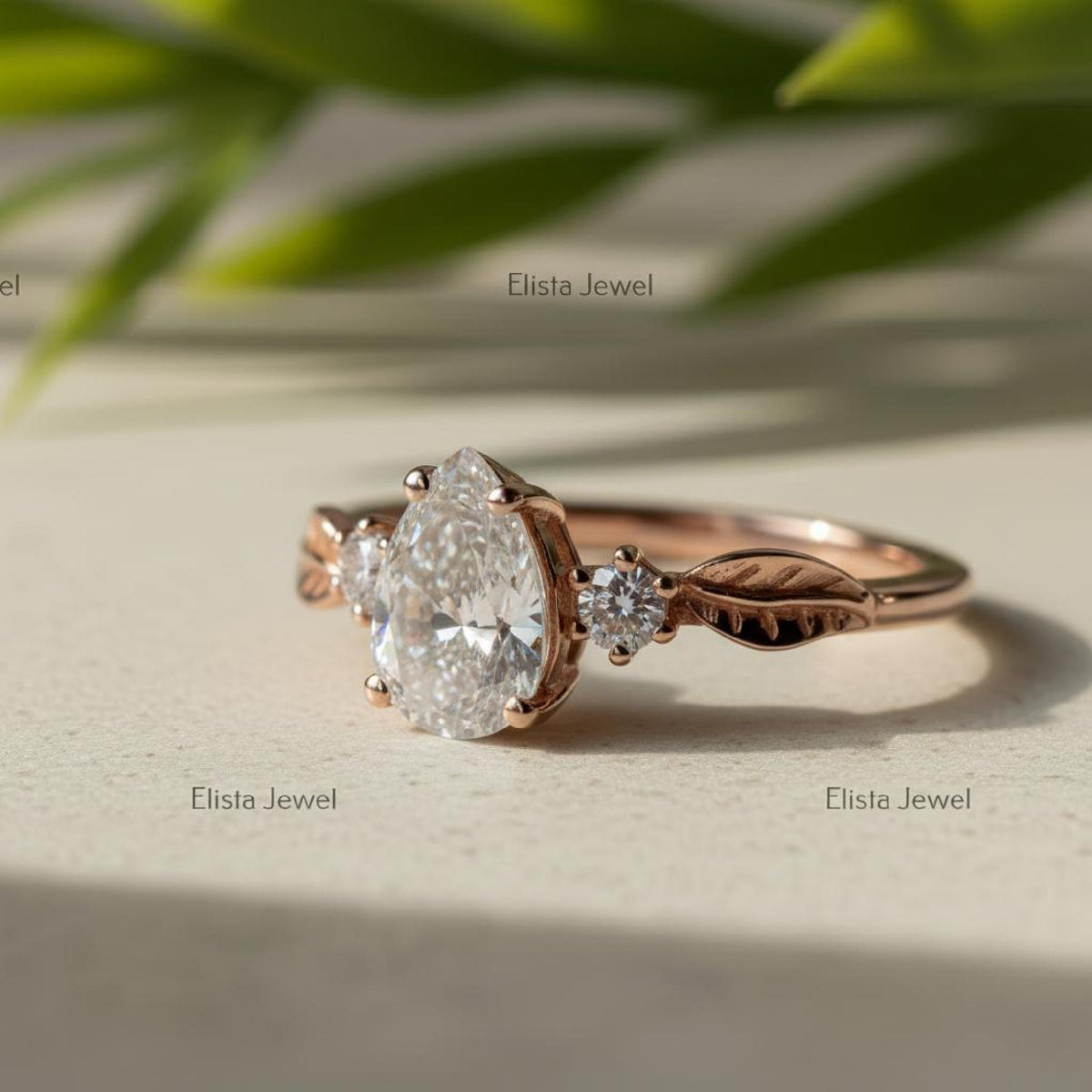 Pear Engagement Ring, Lab-Grown Diamond Rose Gold Leaf Three Stone