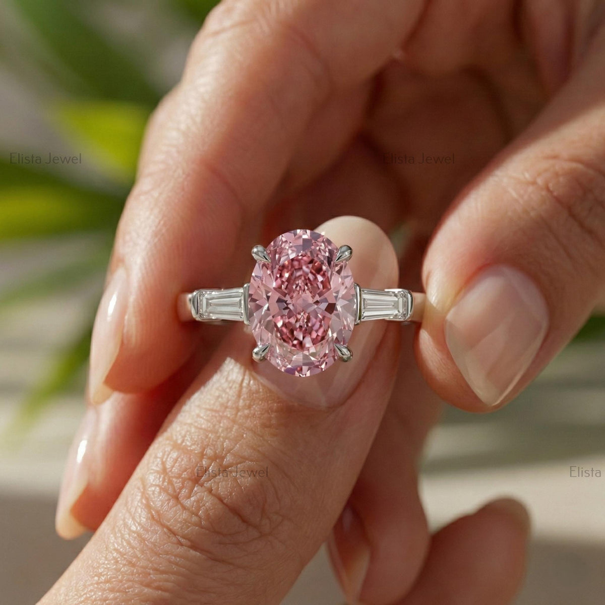 Oval Lab Grown Pink Diamond Three Stone Engagement Ring With Tapered Baguette Side Stones