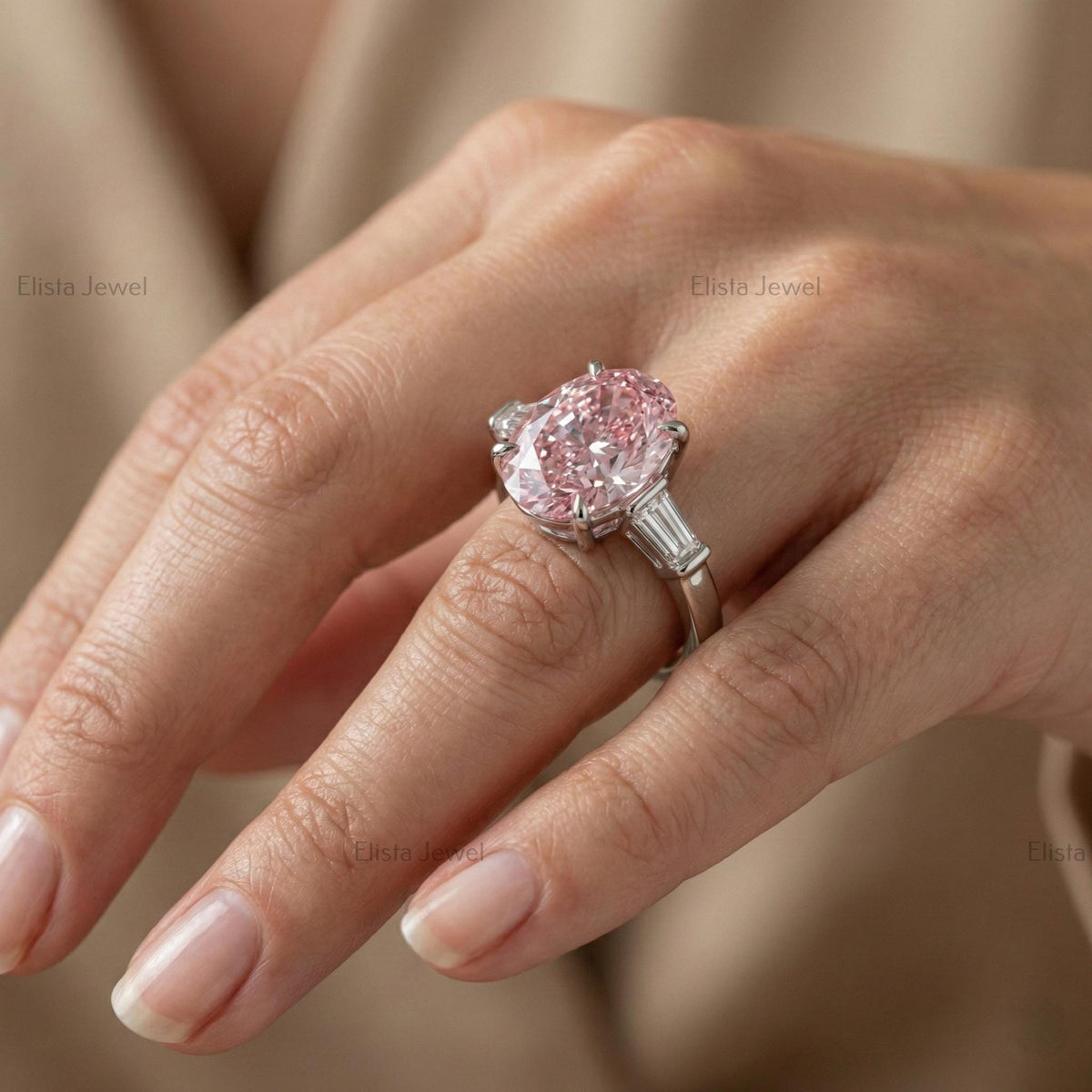 Oval Lab Grown Pink Diamond Three Stone Engagement Ring With Tapered Baguette Side Stones