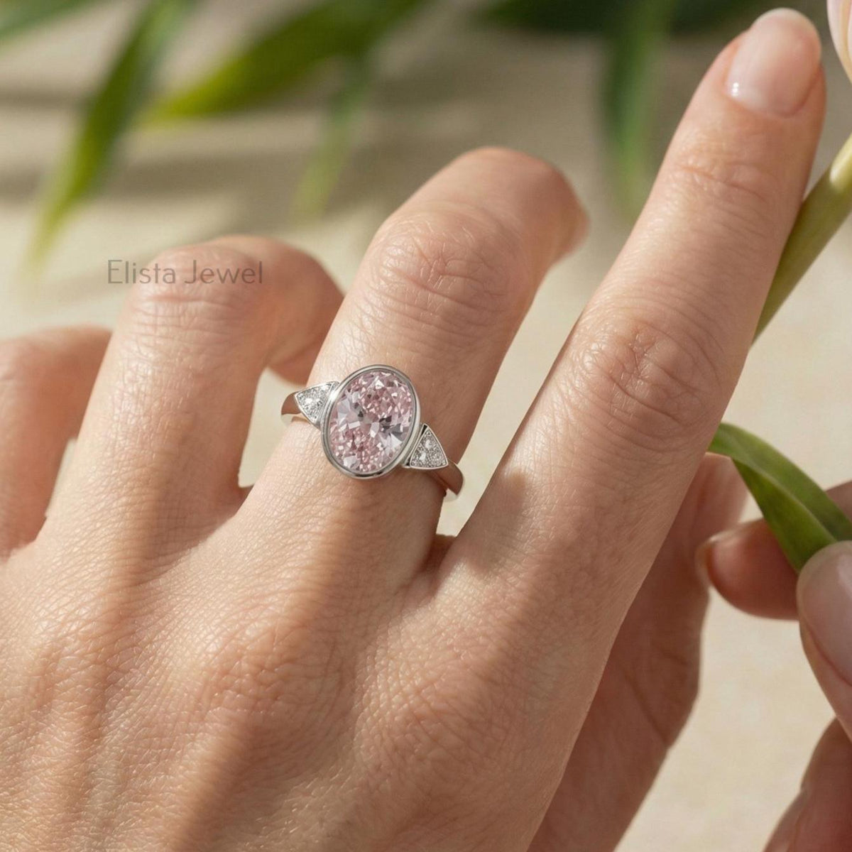 Oval Lab Grown Diamond Pink Three Stone Bezel Engagement Ring
