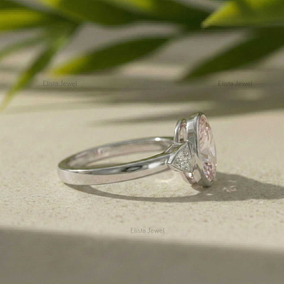 Oval Lab Grown Diamond Pink Three Stone Bezel Engagement Ring