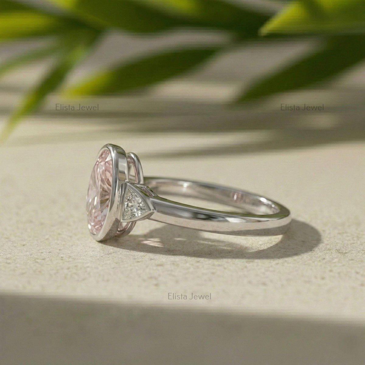 Oval Lab Grown Diamond Pink Three Stone Bezel Engagement Ring