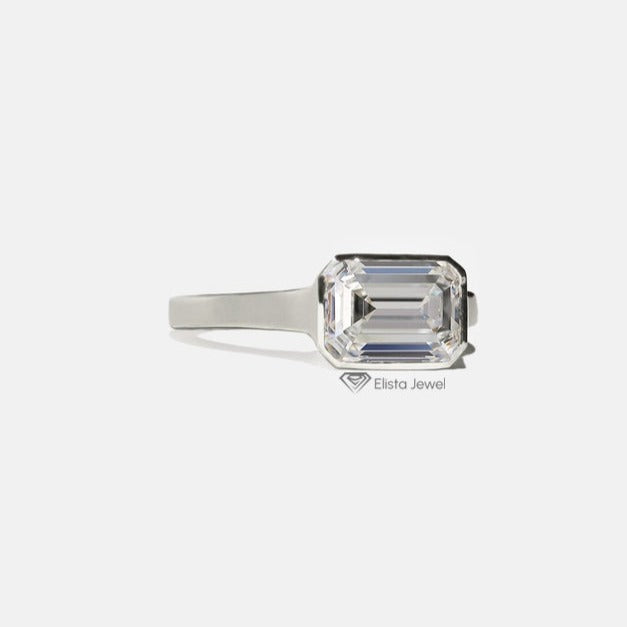 East West Emerald Solitaire Full Bezel Ring