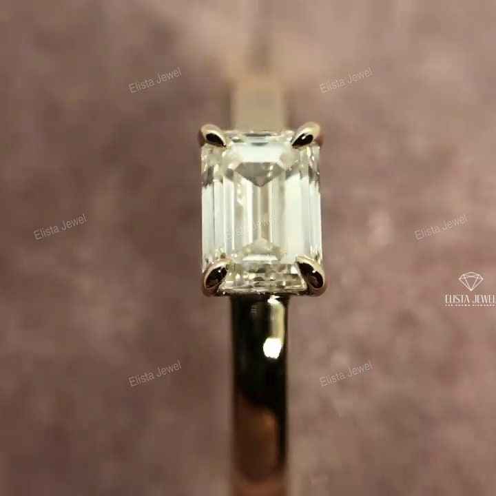 East West Emerald Cut Solitaire Ring
