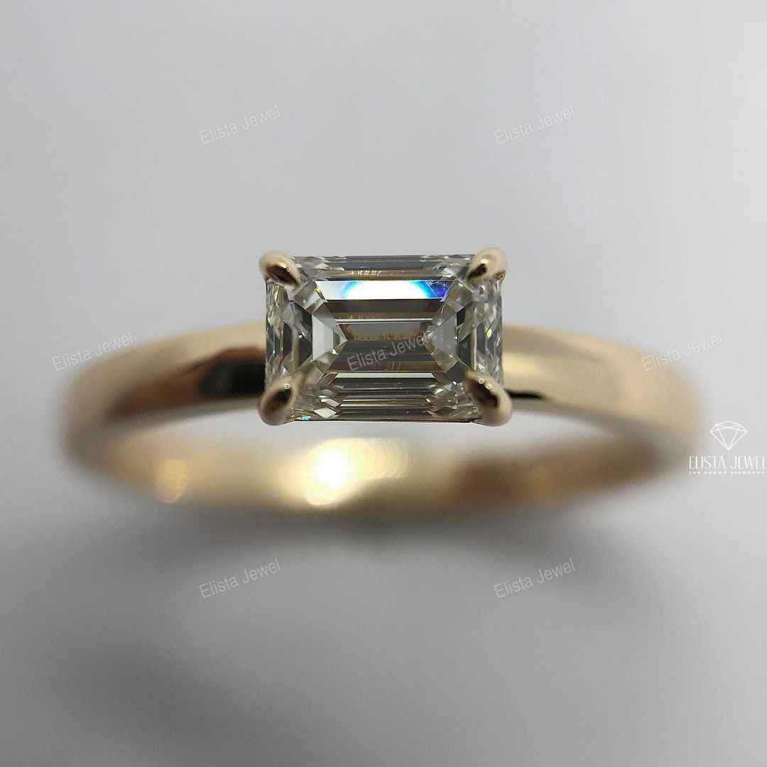 East West Emerald Cut Solitaire Ring