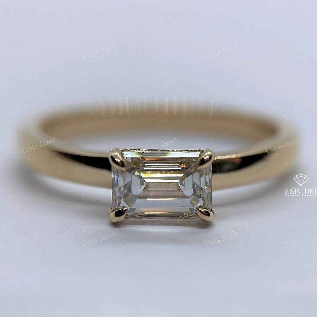 East West Emerald Cut Solitaire Ring