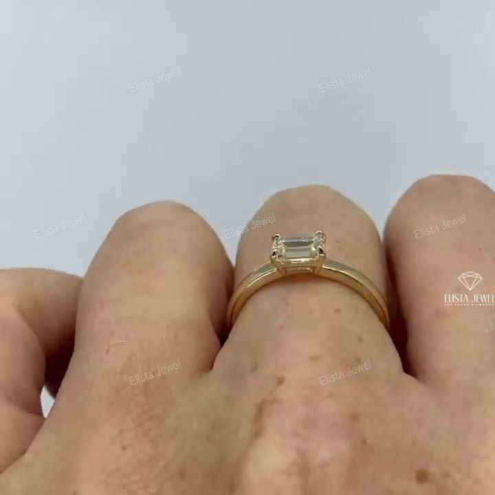 East West Emerald Cut Solitaire Ring