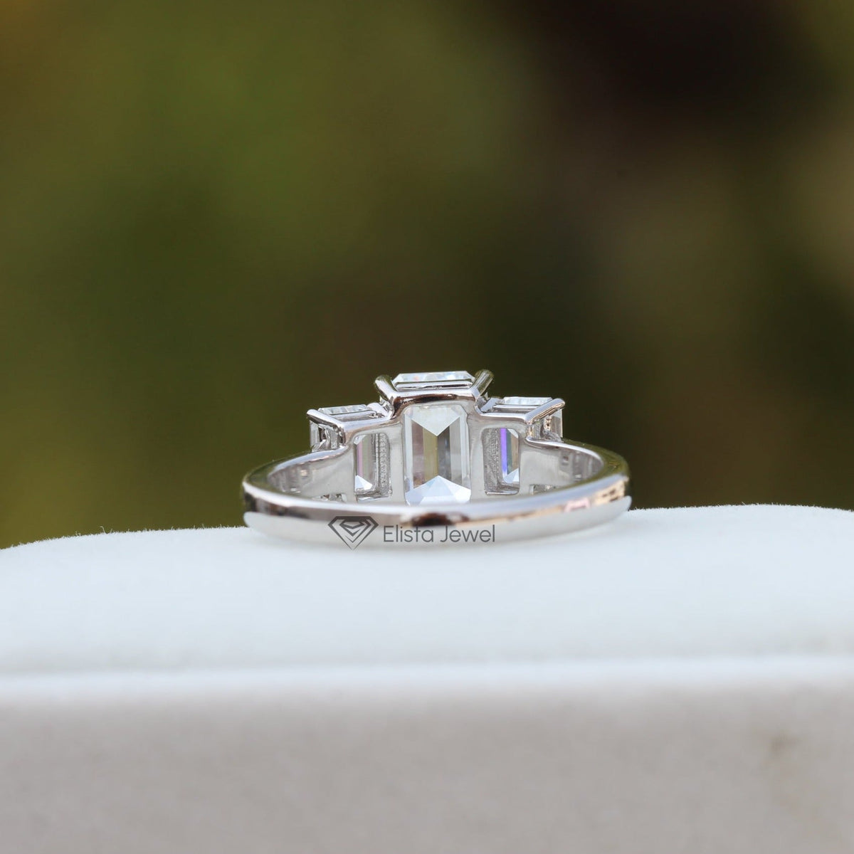 Emerald Cut Three Stone Engagement Lab Grown Diamond Ring in 18K - Angled View