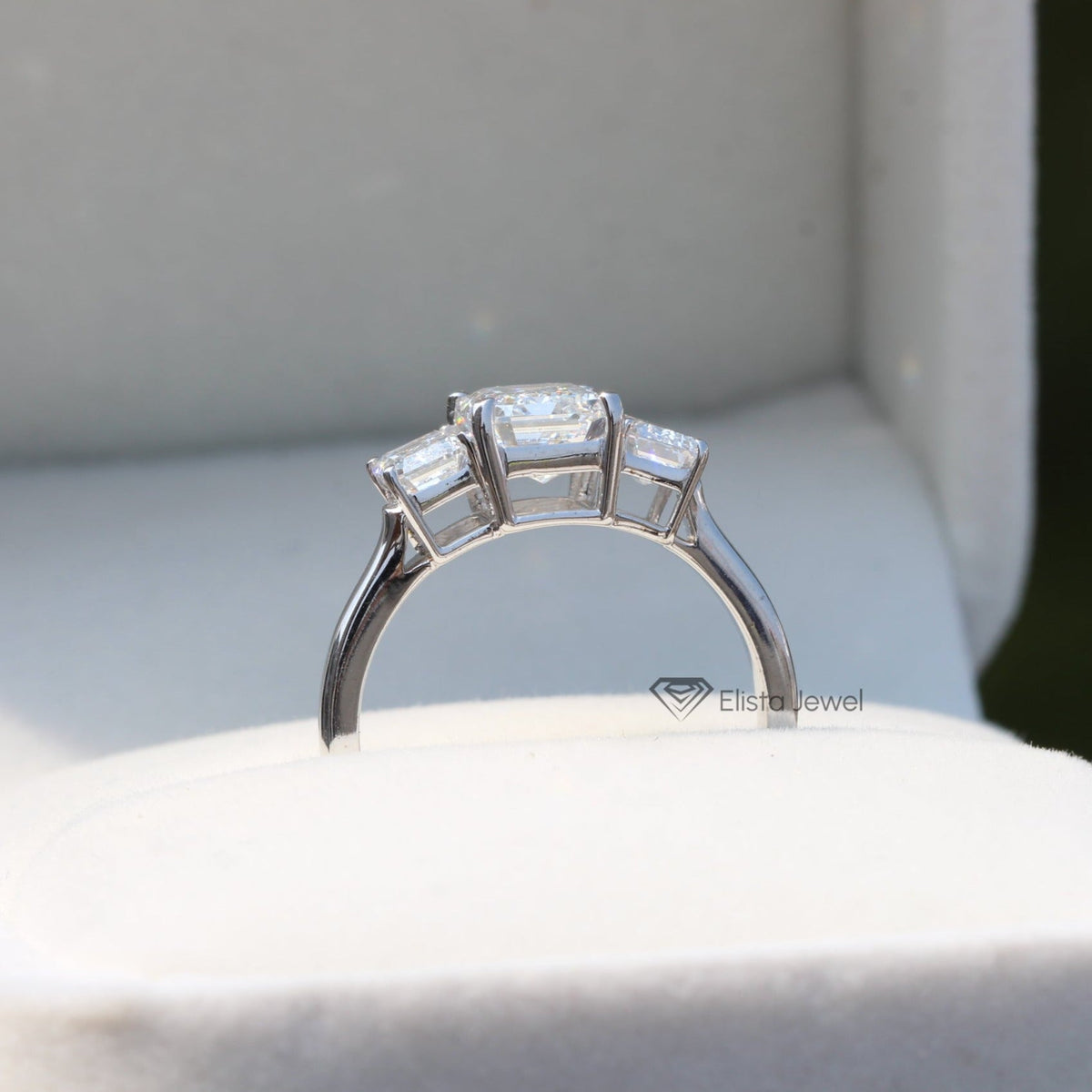 Emerald Cut Three Stone Engagement Lab Grown Diamond Ring - Profile View
