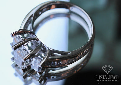 Emerald Cut Three Stone Proposal Ring