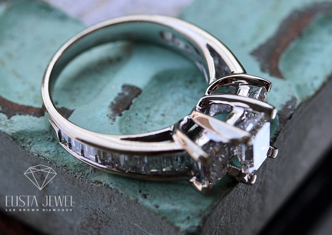 Emerald Cut Three Stone Proposal Ring