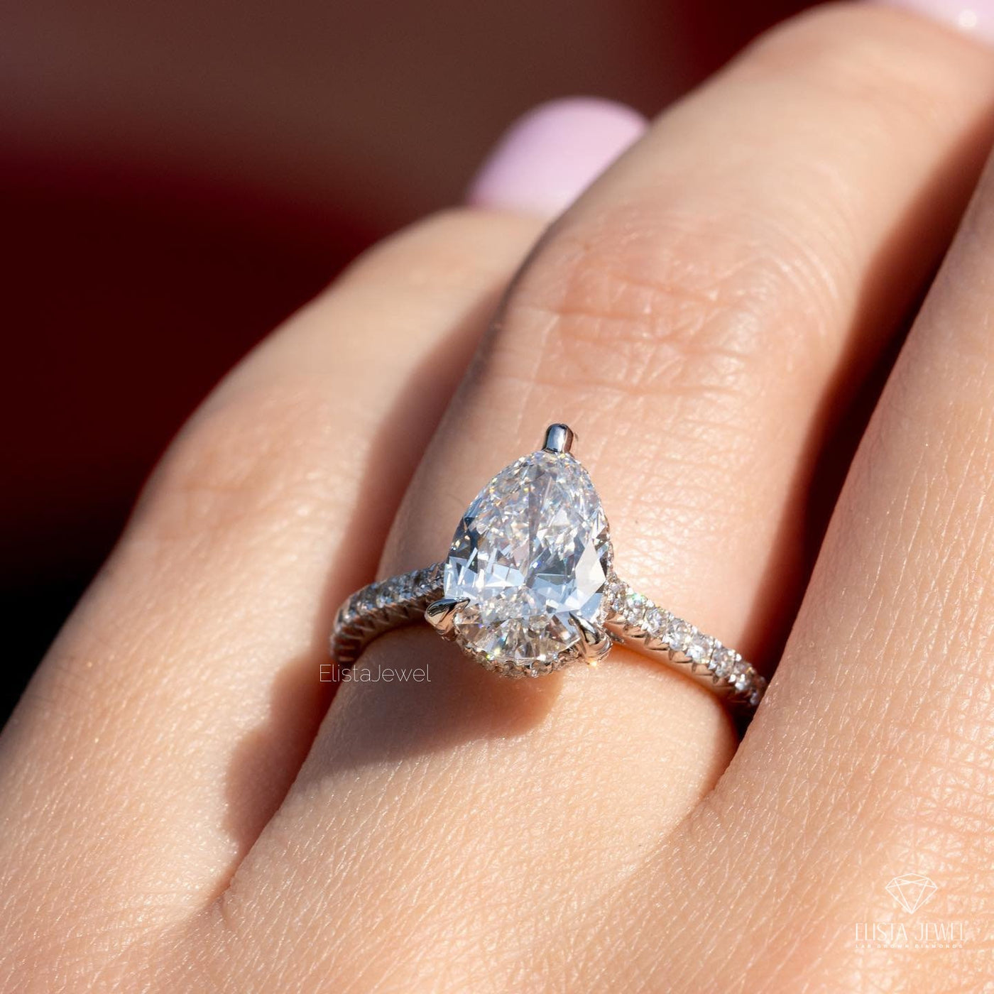Pear Cut Accent Engagement Ring