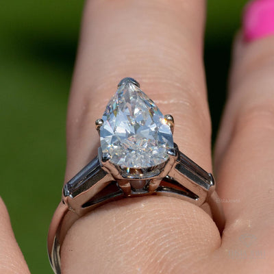 Pear Cut Three Stone Engagement Ring