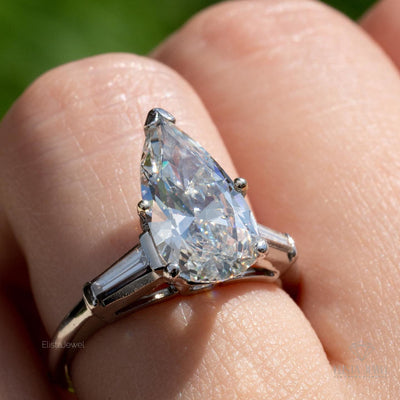 Pear Cut Three Stone Engagement Ring