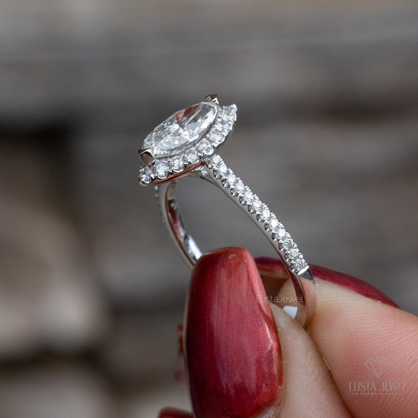 Marquise Cut Halo Accent Engagement Ring