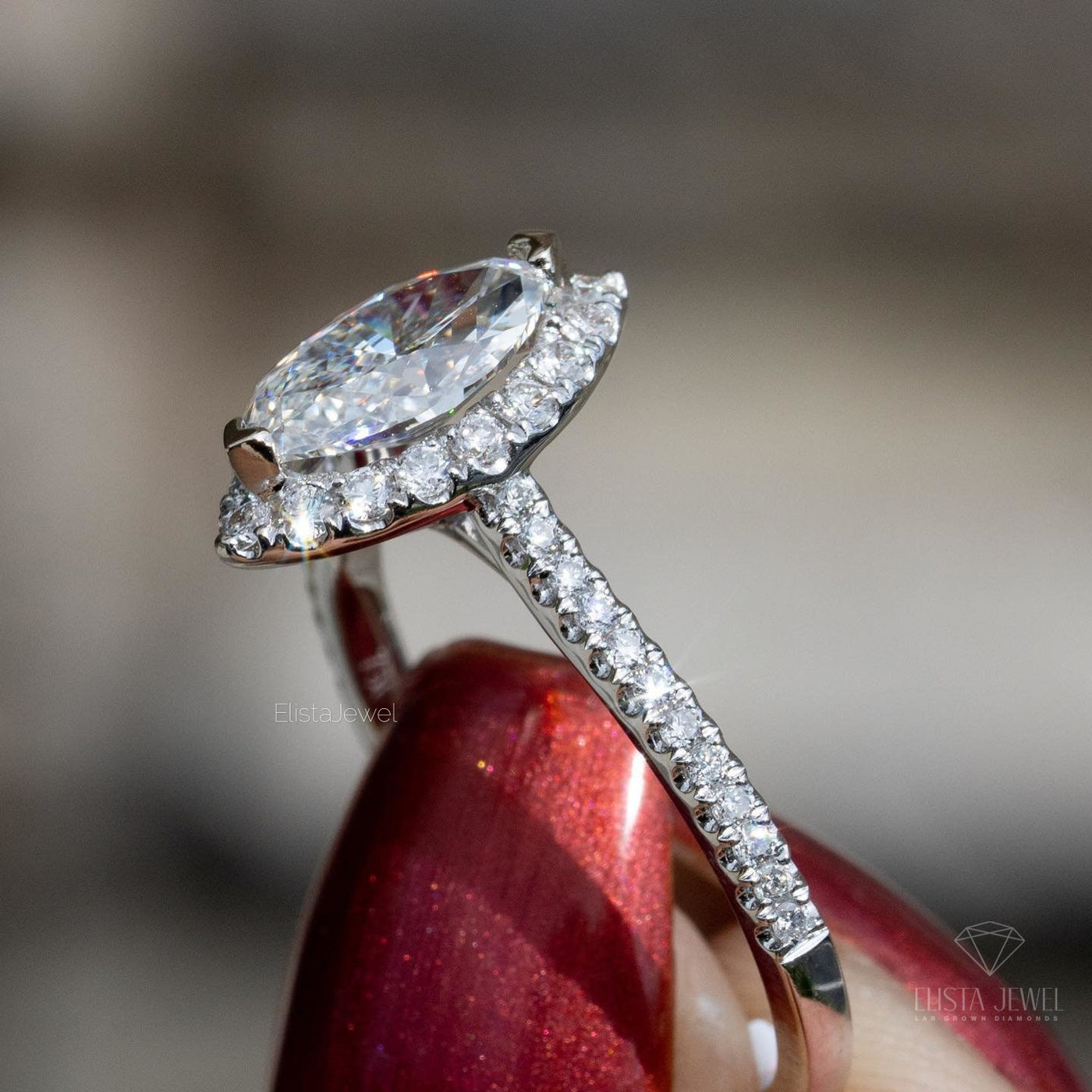 Marquise Cut Halo Accent Engagement Ring