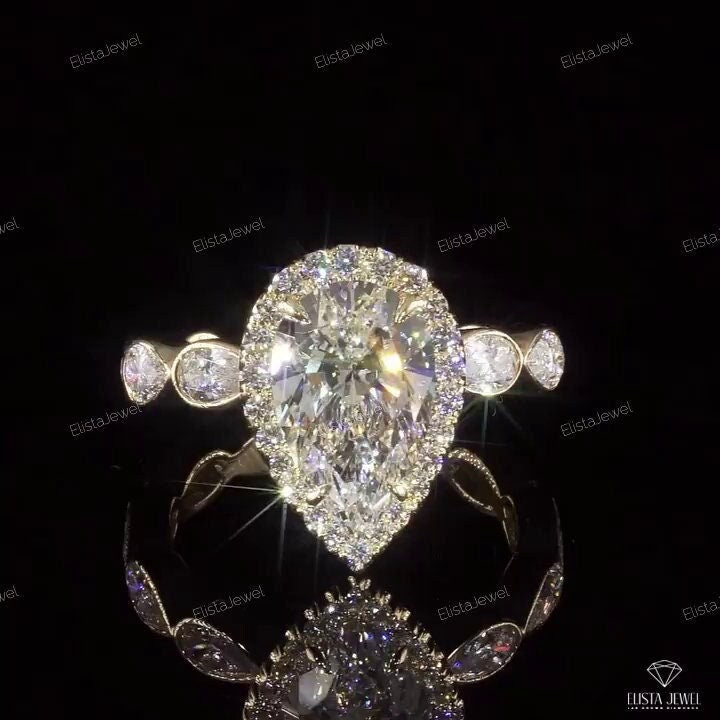Pear Cut Halo Accent Engagement Ring