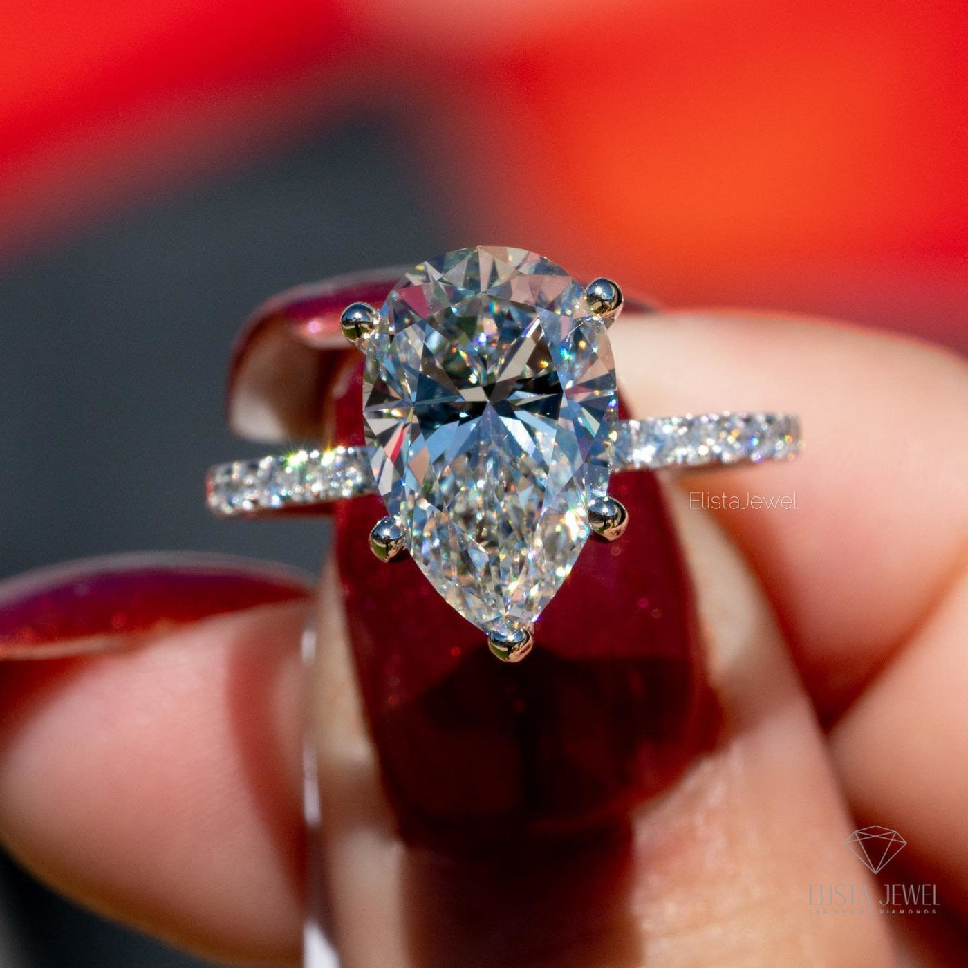 Pear Cut Accent Engagement Ring