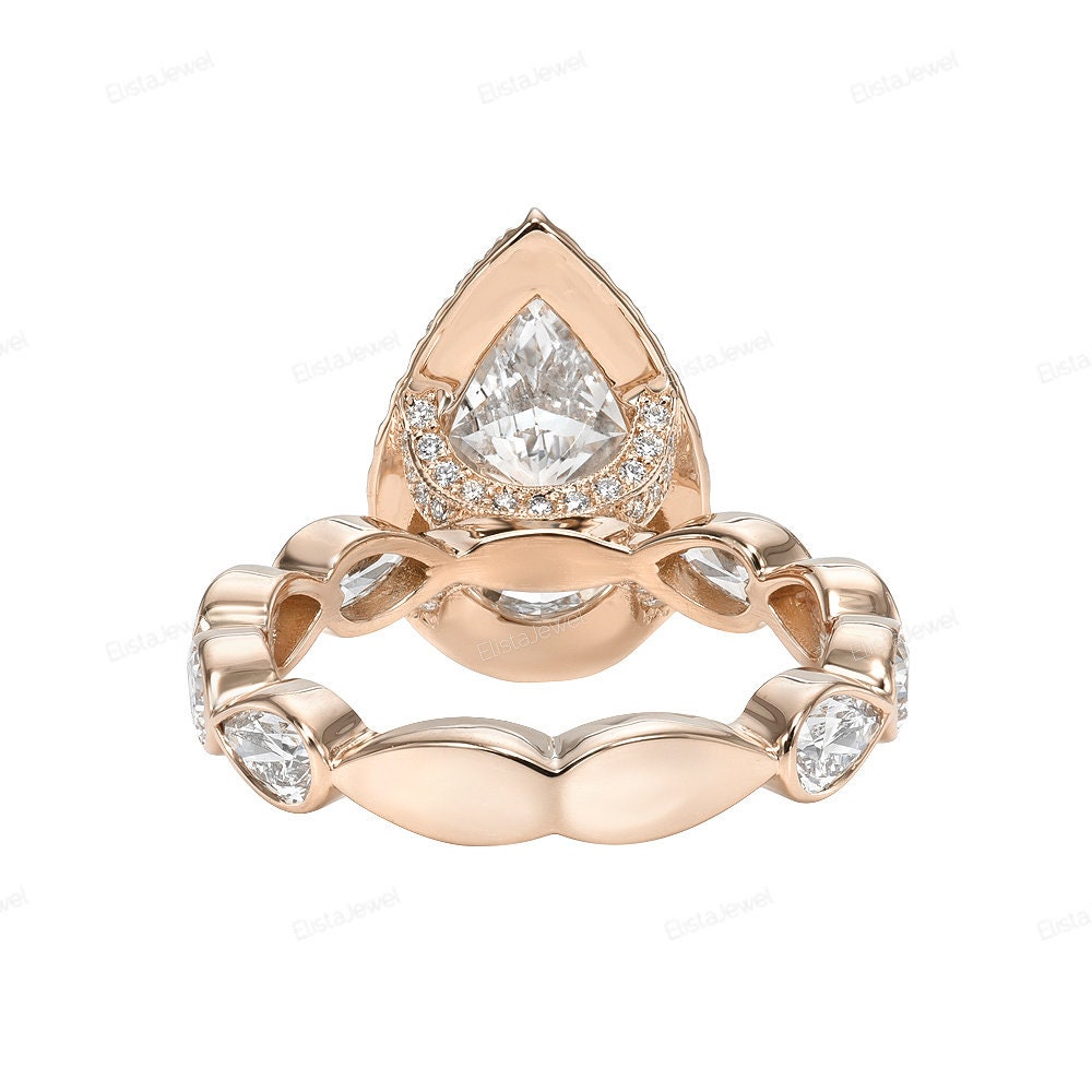 Pear Cut Halo Accent Engagement Ring