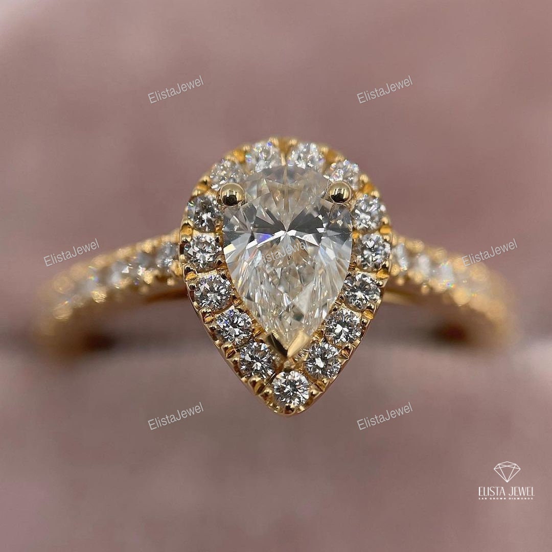 Pear Cut Halo Accent Engagement Ring