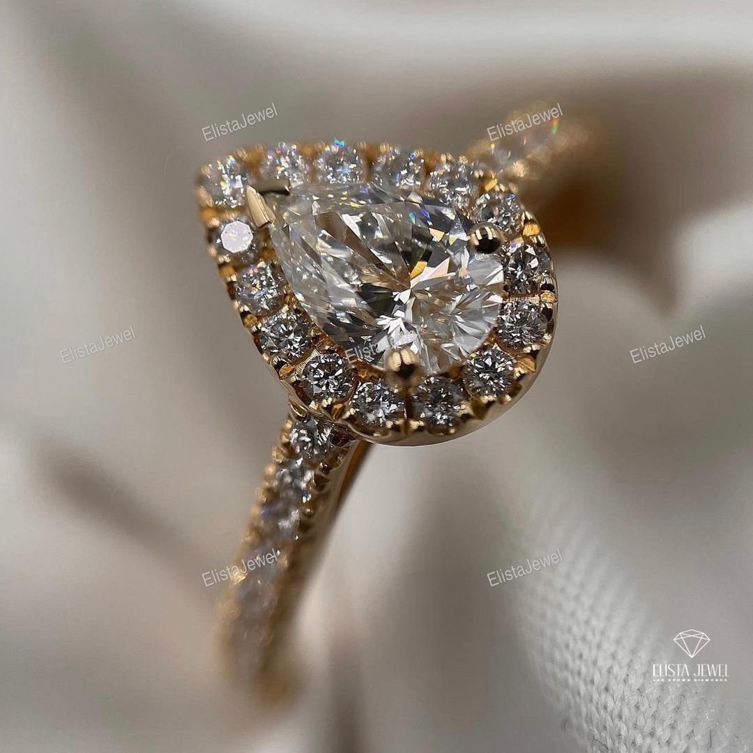 Pear Cut Halo Accent Engagement Ring
